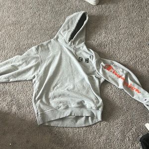 CHAMPION HOODIE / GREY ; WORDS ACROSS SLEEVE ORANGE